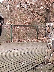 15 pictures - Gorgeous brunette in boots pisses outside