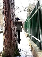 15 pictures - Gorgeous dark haired babe pisses on the snow