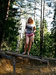 16 pictures - Precious girlie busted peeing on a forest glade