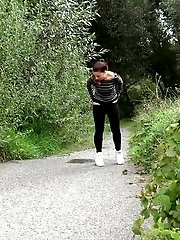 15 pictures - Cute European squatting to pee on a path