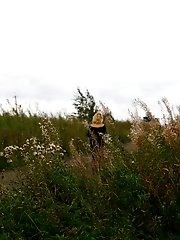 16 pictures - Video of a blonde tart doing the wee-wee on the road