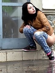 15 pictures - Gorgeous dark haired girl pees in public