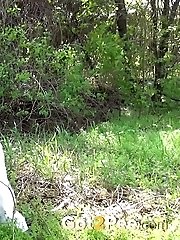 15 pictures - Dark haired girl in sunglasses pisses outside
