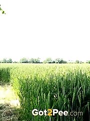 15 pictures - Blonde with plaited hair squats to piss outside