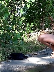 15 pictures - Pretty dark haired girl nearly wets her shorts