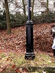 15 pictures - Brunette in boots pisses over stone steps