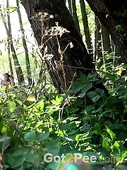 15 pictures - ass is on full view in this outdoor peeing scene