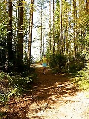 16 pictures - Cute brunette squats down to take a leak in forest