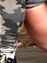 15 pictures - Pretty babe pisses onto a wooden terrace