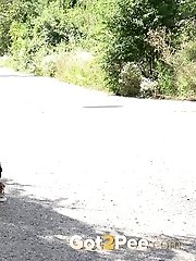 15 pictures - Cute babe rushes to beat her pee desperation