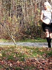 15 pictures - Pretty blonde in boots pisses on the ground