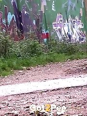 15 pictures - Hot dark haired girl squats on a path to pee