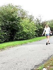 15 pictures - Gorgeous babe in hotpants pisses outside