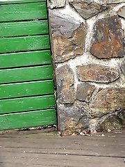 15 pictures - Pretty babe pisses onto a wooden terrace