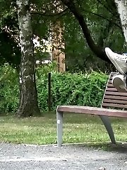 15 pictures - Gorgeous redhead lifts up her legs to piss outside