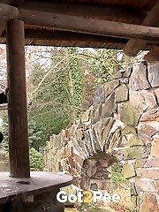 15 pictures - Redhead in knee high socks pisses outside