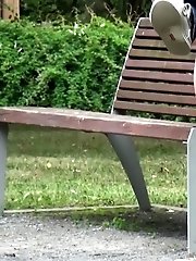 15 pictures - Gorgeous redhead lifts up her legs to piss outside